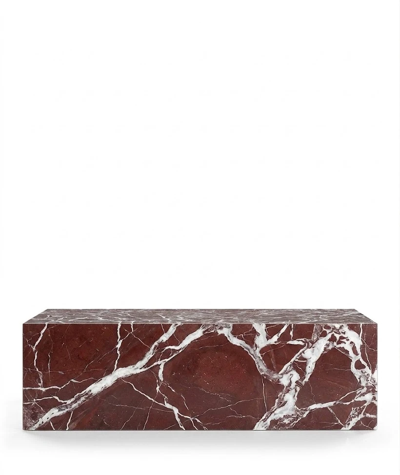 Rosso Levanto marble plinth coffee table on a white studio background, deep burgundy ground with white veining